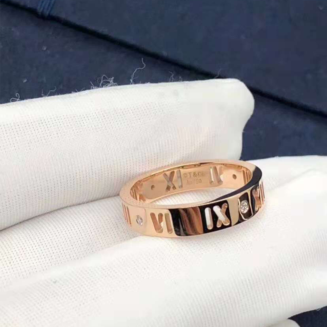 Tiffany & Co. Atlas durchbohrte Ring in 18 Karat Roségold mit Diamanten